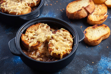 Delicious onion soup with croutons and cheese