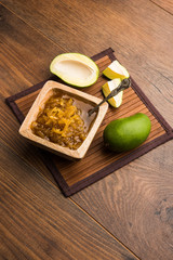 Mango Chunda or Sakhar Amba is a traditional indian summer recipe made using accha aam preserved in sugar syrup for days. selective focus
