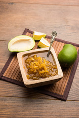 Mango Chunda or Sakhar Amba is a traditional indian summer recipe made using accha aam preserved in sugar syrup for days. selective focus