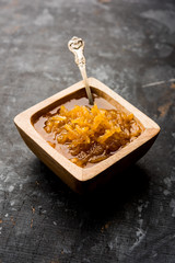 Mango Chunda or Sakhar Amba is a traditional indian summer recipe made using accha aam preserved in sugar syrup for days. selective focus