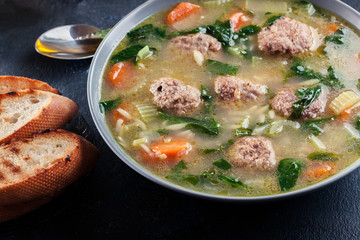 Italian wedding soup with meatballs and vegetables