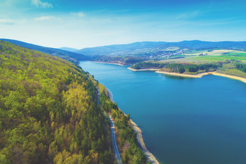 Fototapeta na wymiar Mountain lake in early spring. View from above