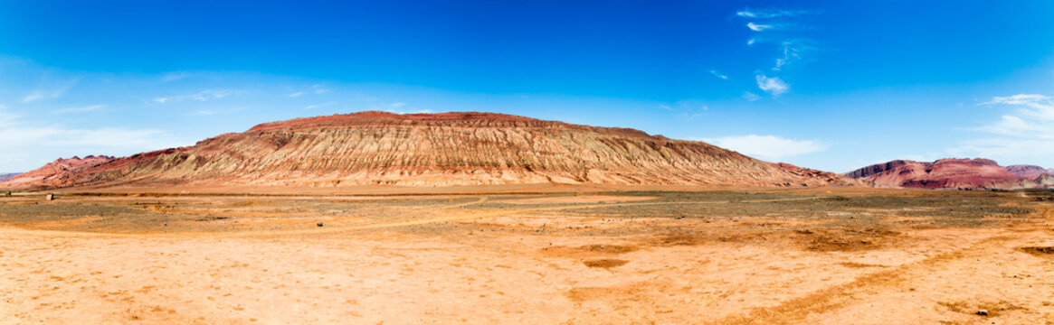 Flaming mountains, Turpan, Xinjiang, China: these intense red arid mountains similar to scorching flames appear in the Chinese epic &ldquo;Journey to the west&rdquo;. Turpan is an ancient oasis on the Silk Road