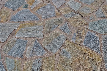 unusual wall background of old stones