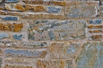 unusual wall background of old stones