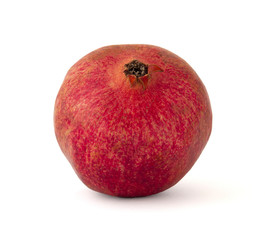 Red ripe juicy pomegranate with bright ruby filled with sweet tasty juice