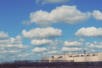 Obraz premium factory and clouds 