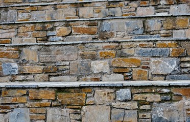 unusual view of the steps from different stones of different colors