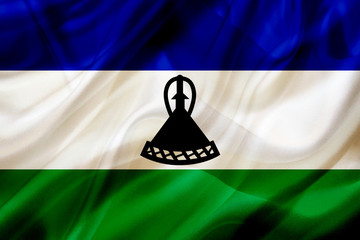 Lesotho country flag on silk or silky waving texture