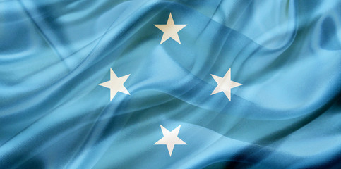 Micronesia country flag on silk or silky waving texture