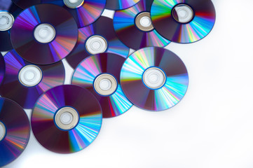Bunch of cd discs on a white background