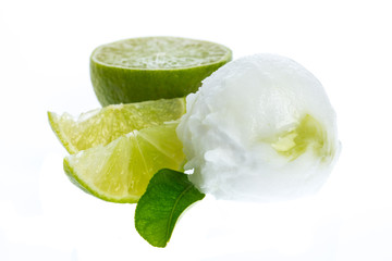single sour lemon ice cream ball with lemon and lemon leaf
