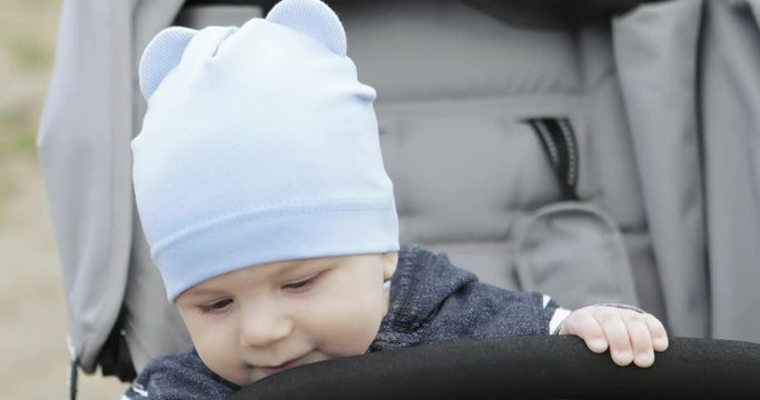Baby boy in a stroller