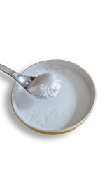 Fototapeta na wymiar A spoonfull over a bowl of organic home made yogurt