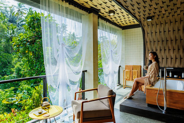 Young asian woman in a balinese spa