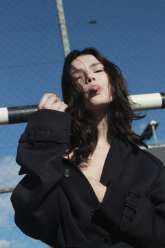 Photo of a female model posing in front of camera