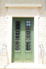 Fototapeta premium wooden front door with glass panels