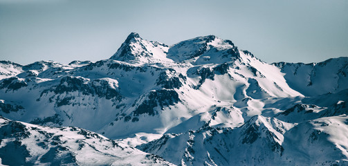 Alpine Mountain Peaks Panorama on Sunny Winter Morning