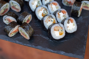 street photo of a set of rolls under the daylight on a blurry background