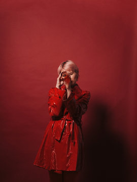 Studio Portrait Of Woman In Red Clothes