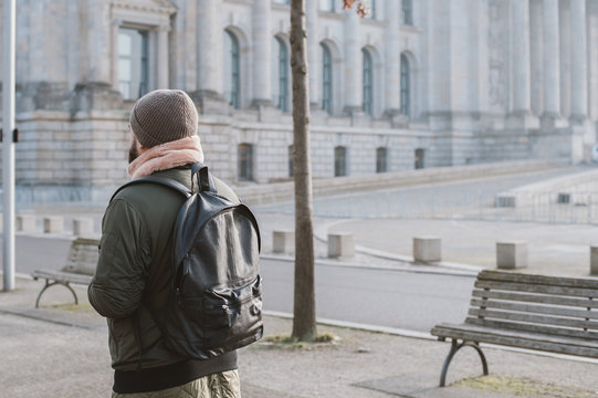 Man with backpack outdoors