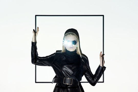 Trendy woman in front of projector