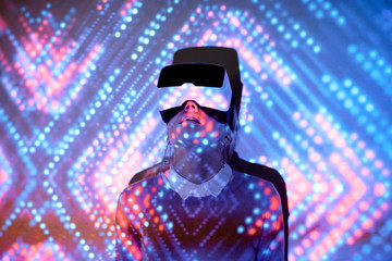 Woman immersed into virtual reality