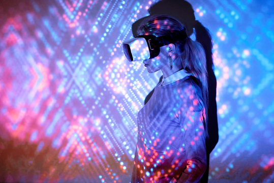 Woman with VR display - Powered by Adobe