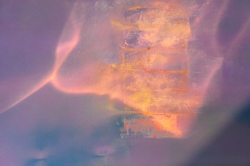 Abstract magic background with pastel traces on holographic background