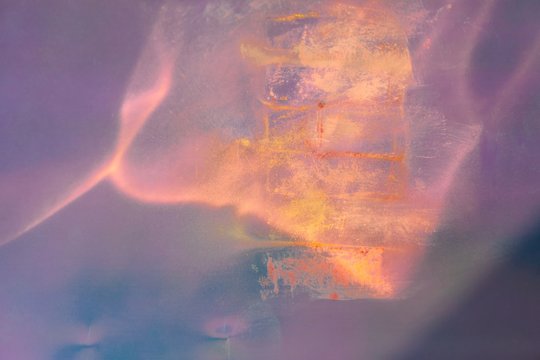 Abstract magic background with pastel traces on holographic background