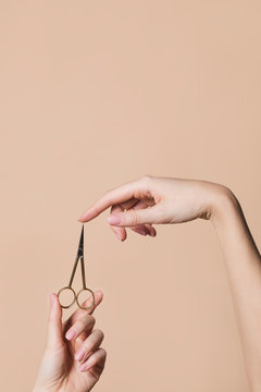 Woman Holding Nail Scissors