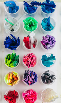Elastomeric dental ligatures