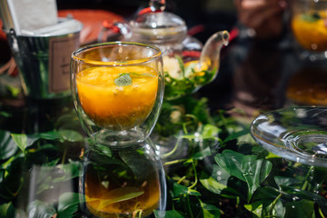 Fresh passion fruit and a glass of passion fruit drink