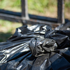 Black plastic decomposing garbage bag