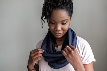 Women trying on her scarf