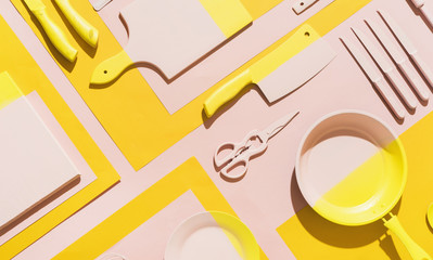 Pink and yellow kitchen objects/utensil.