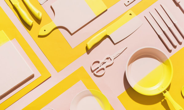 Pink and yellow kitchen objects/utensil.