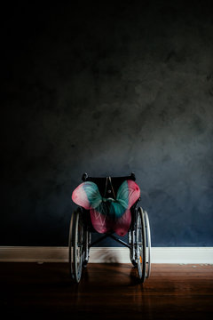 an empty wheelchair with wings