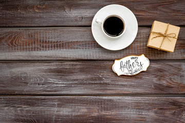 Happy Father Day with gift and coffee on wooden background top view mockup