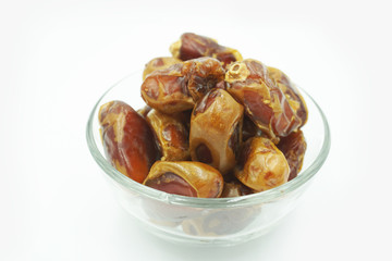 Kurma or dates fruits isolated on white background