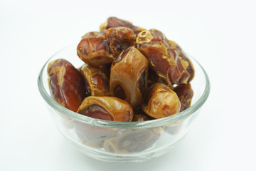 Kurma or dates fruits isolated on white background