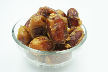 Kurma or dates fruits isolated on white background