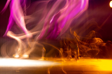 Scene of dancers in theater with long exposure