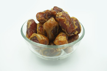 Kurma or dates fruits isolated on white background