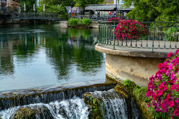 Scenic view on river Sorgue in colorful old town Lisle-sul-la-Sorgue in Provence, France