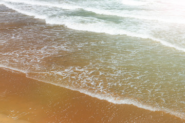 Stunning ocean sand beach with calm waves