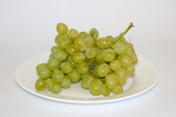 isolated bunch of grapes on a plate