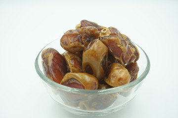 Kurma or dates fruits isolated on white background