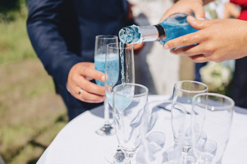 dishes on banquet tables, serving glasses, spoons and plates