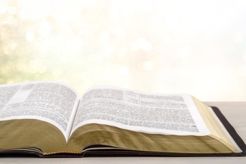 Holy Bible  book on a wooden background